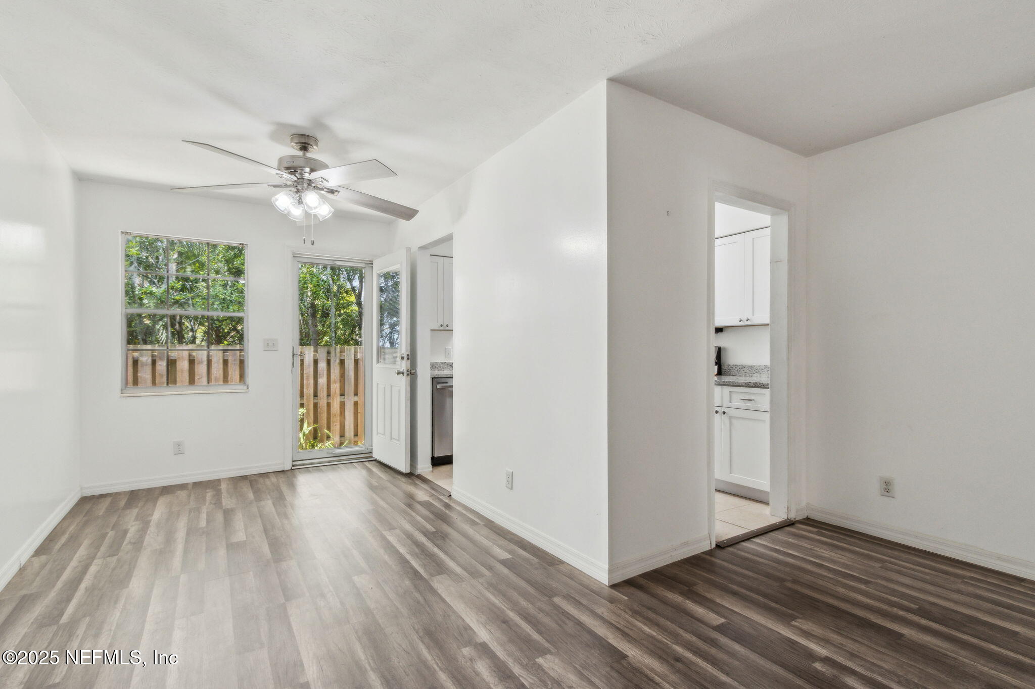 1846 Mallory Street, Unit 8 Jacksonville, FL 32205 - Photo 11 of 25 wooden floor in an empty room with a window