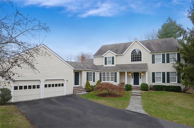 421 North Street Ridgefield, CT 06877 - Photo 1 of 1 a view of a big house with a big yard and large tree