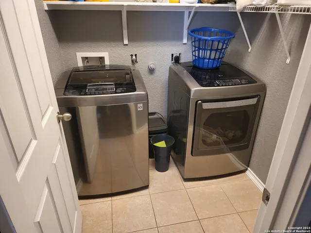 a kitchen with a stove and a microwave