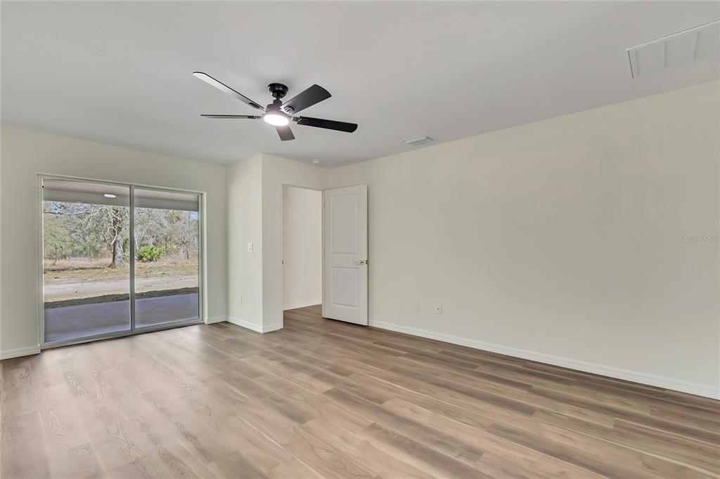 11929 West Cornflower Drive Crystal River, FL 34428 - Photo 22 of 50 a view of an empty room with a window