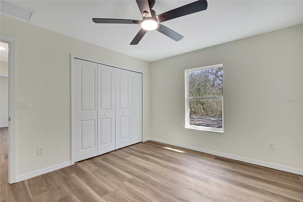 11929 West Cornflower Drive Crystal River, FL 34428 - Photo 28 of 50 a view of an empty room with a window