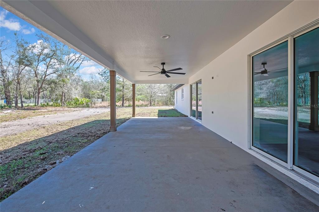 11929 West Cornflower Drive Crystal River, FL 34428 - Photo 39 of 50 a view of a big room with wooden floor and stairs