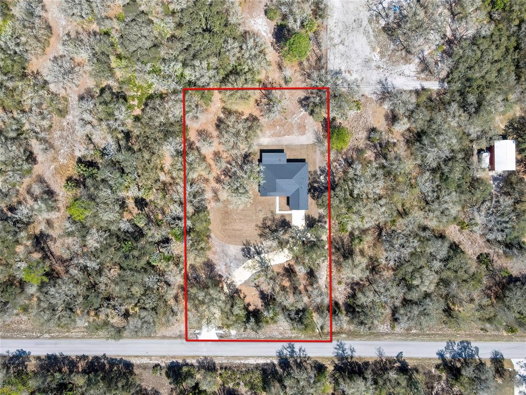 11929 West Cornflower Drive Crystal River, FL 34428 - Photo 5 of 50 front view of a house with a yard