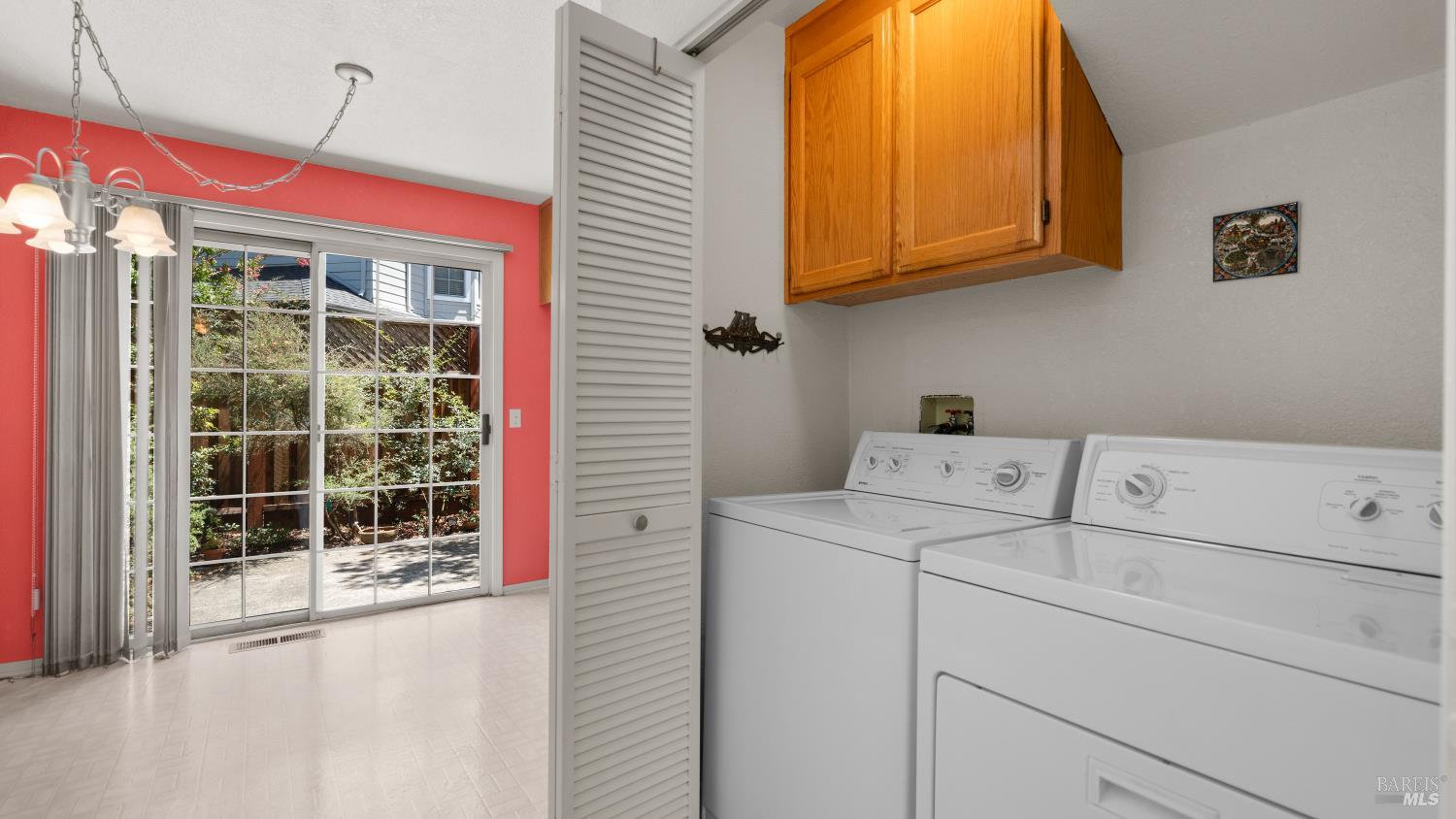 950 Wright Street Santa Rosa, CA 95404 - Photo 11 of 34 Laundry Closet between stairway and Kitchen