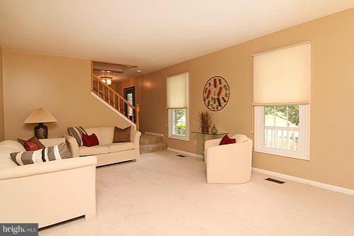 897 Bear Branch Road Westminster, MD 21157 - Photo 1 of 24 a living room with furniture and a window