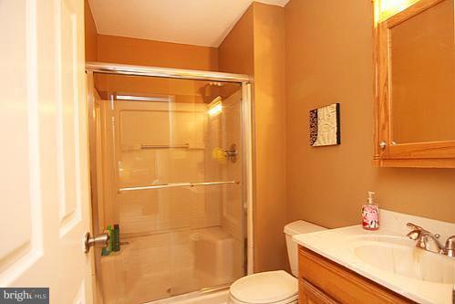 897 Bear Branch Road Westminster, MD 21157 - Photo 22 of 24 a bathroom with a sink toilet and shower