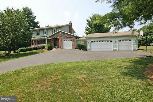 897 Bear Branch Road Westminster, MD 21157 - Photo 23 of 24 a view of a big house with a big yard and large trees