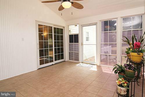 897 Bear Branch Road Westminster, MD 21157 - Photo 5 of 24 a view of a room with window and potted plants