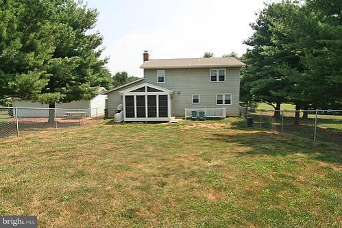 897 Bear Branch Road Westminster, MD 21157 - Photo 9 of 24 a front view of a house with a yard