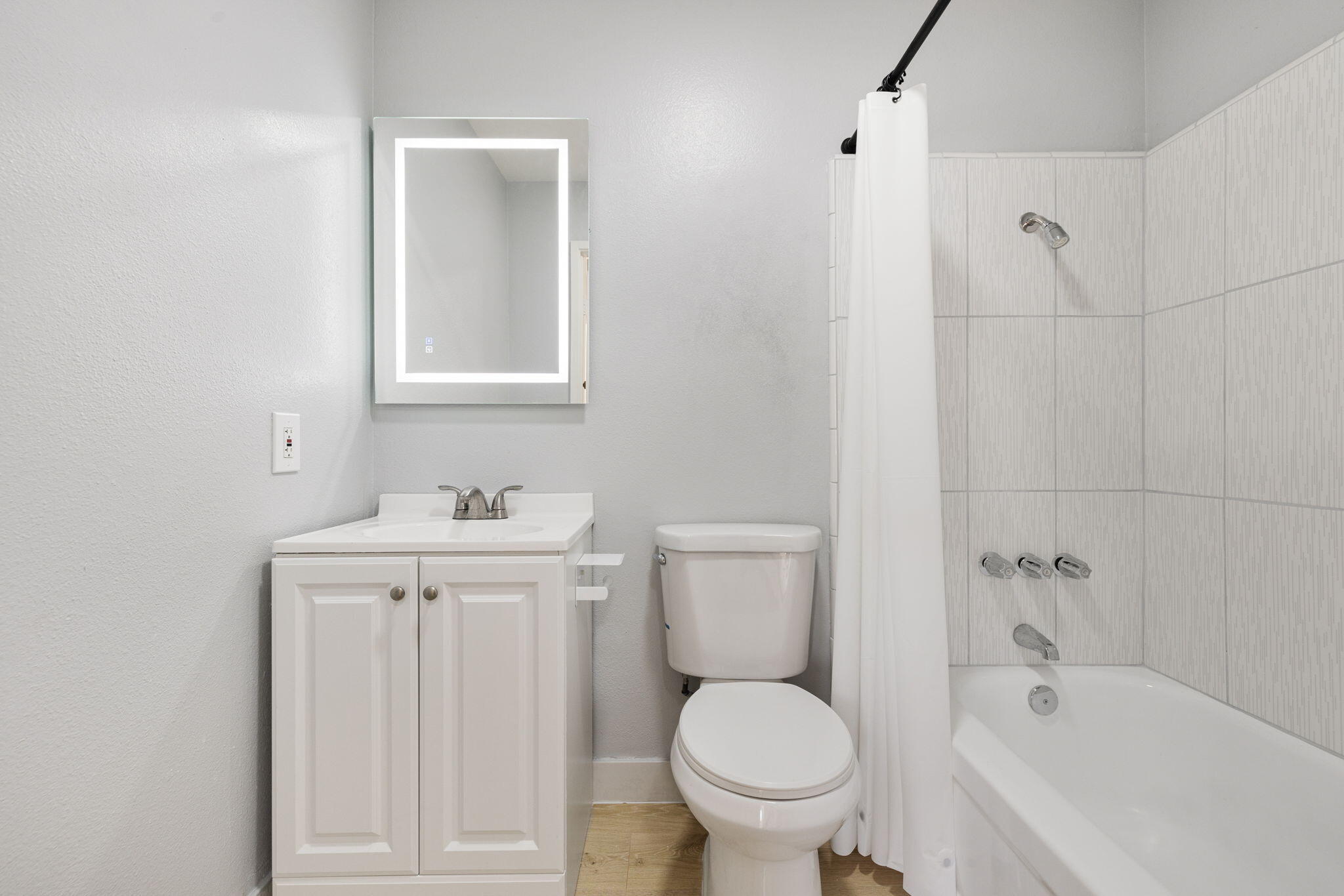 72644 Raven Road, Unit 2 Palm Desert, CA 92260 - Photo 12 of 21 a bathroom with a sink a toilet and bathtub