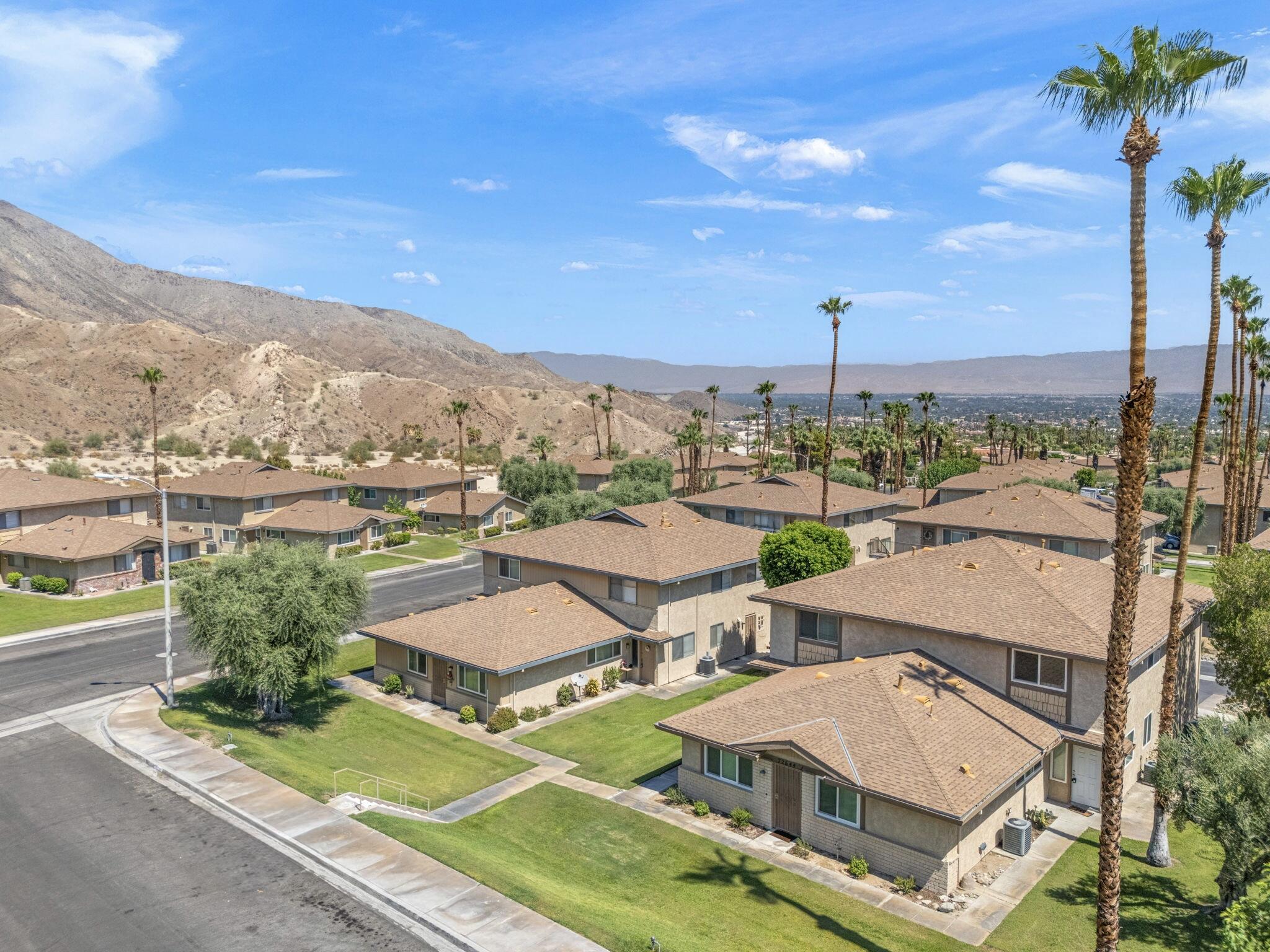 72644 Raven Road, Unit 2 Palm Desert, CA 92260 - Photo 2 of 21 an aerial view of residential houses with outdoor space and street view