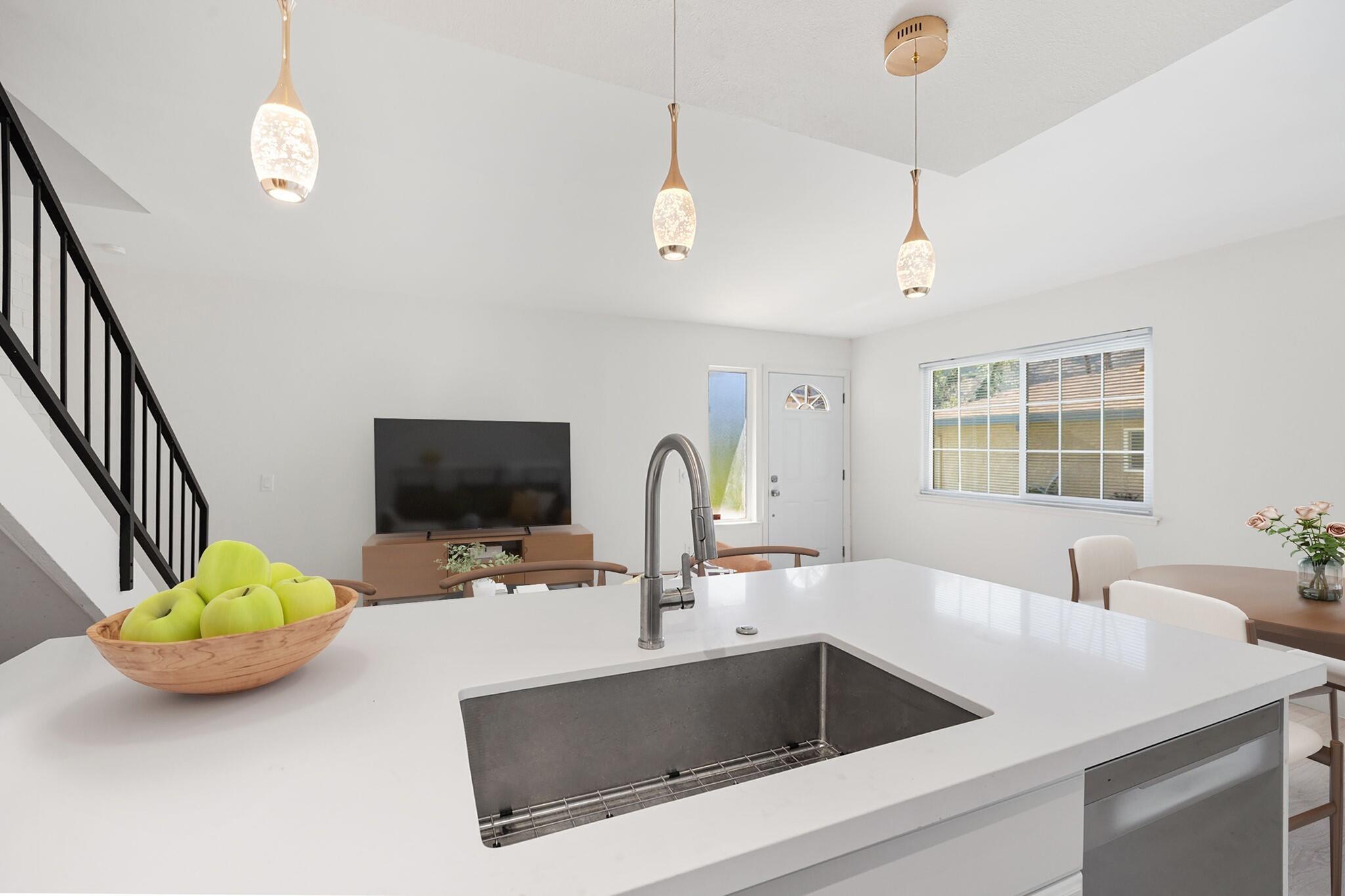 72644 Raven Road, Unit 2 Palm Desert, CA 92260 - Photo 21 of 21 a kitchen with a sink a counter and windows