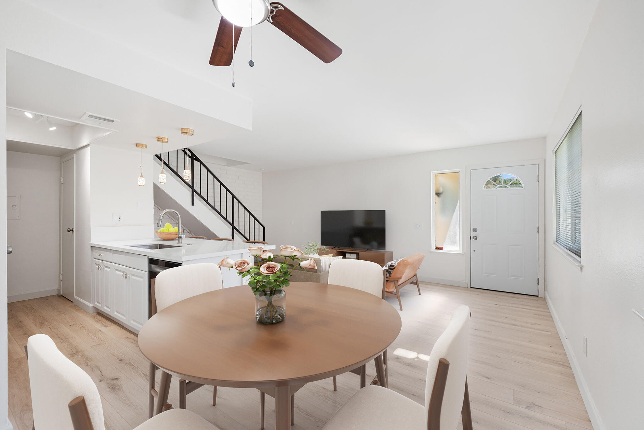 72644 Raven Road, Unit 2 Palm Desert, CA 92260 - Photo 7 of 21 a living room with furniture and a flat screen tv