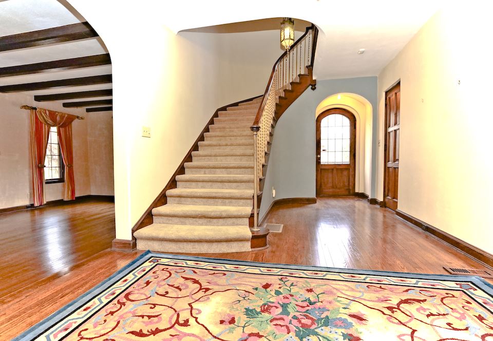 2912 Spring Creek Road Rockford, IL 61107 - Photo 8 of 40 a view of entryway and hall with wooden floor