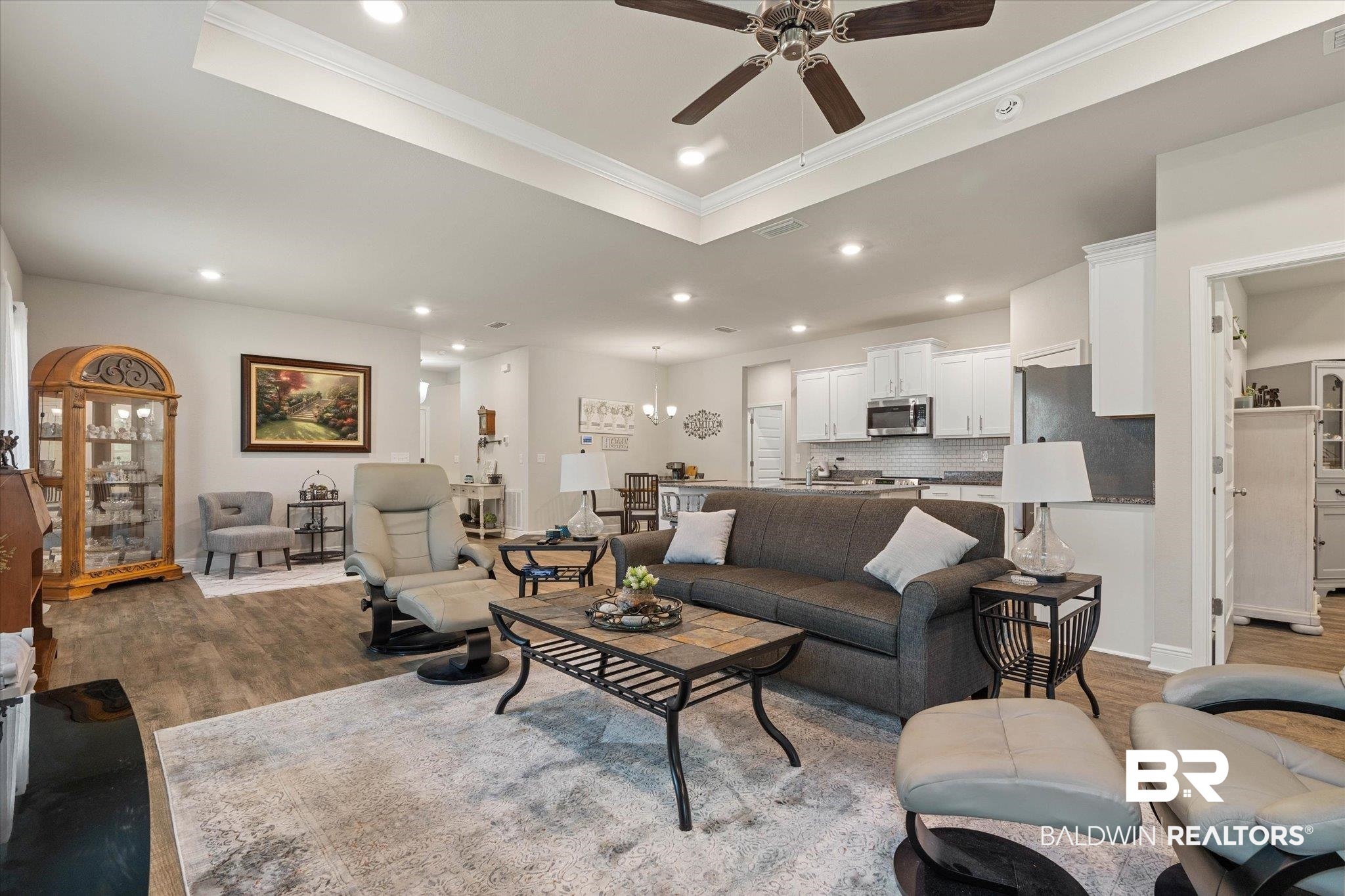 9037 Impala Drive Foley, AL 36535 - Photo 2 of 21 Living room featuring wood finished floors, ornamental molding, ceiling fan, and recessed lighting