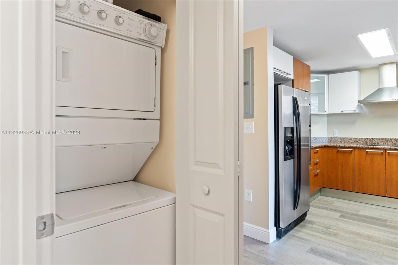 170 Southeast 14th Street, Unit 1906 Miami, FL 33131 - Photo 15 of 26 a utility room with dryer and washer