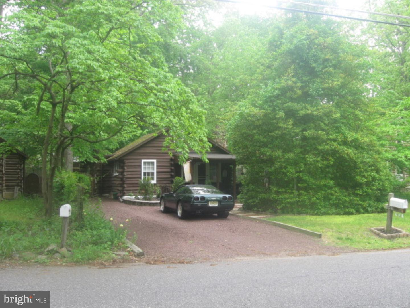 103 Rancocas Boulevard Mount Laurel, NJ 08054 - Photo 1 of 1 a front view of a house with garden