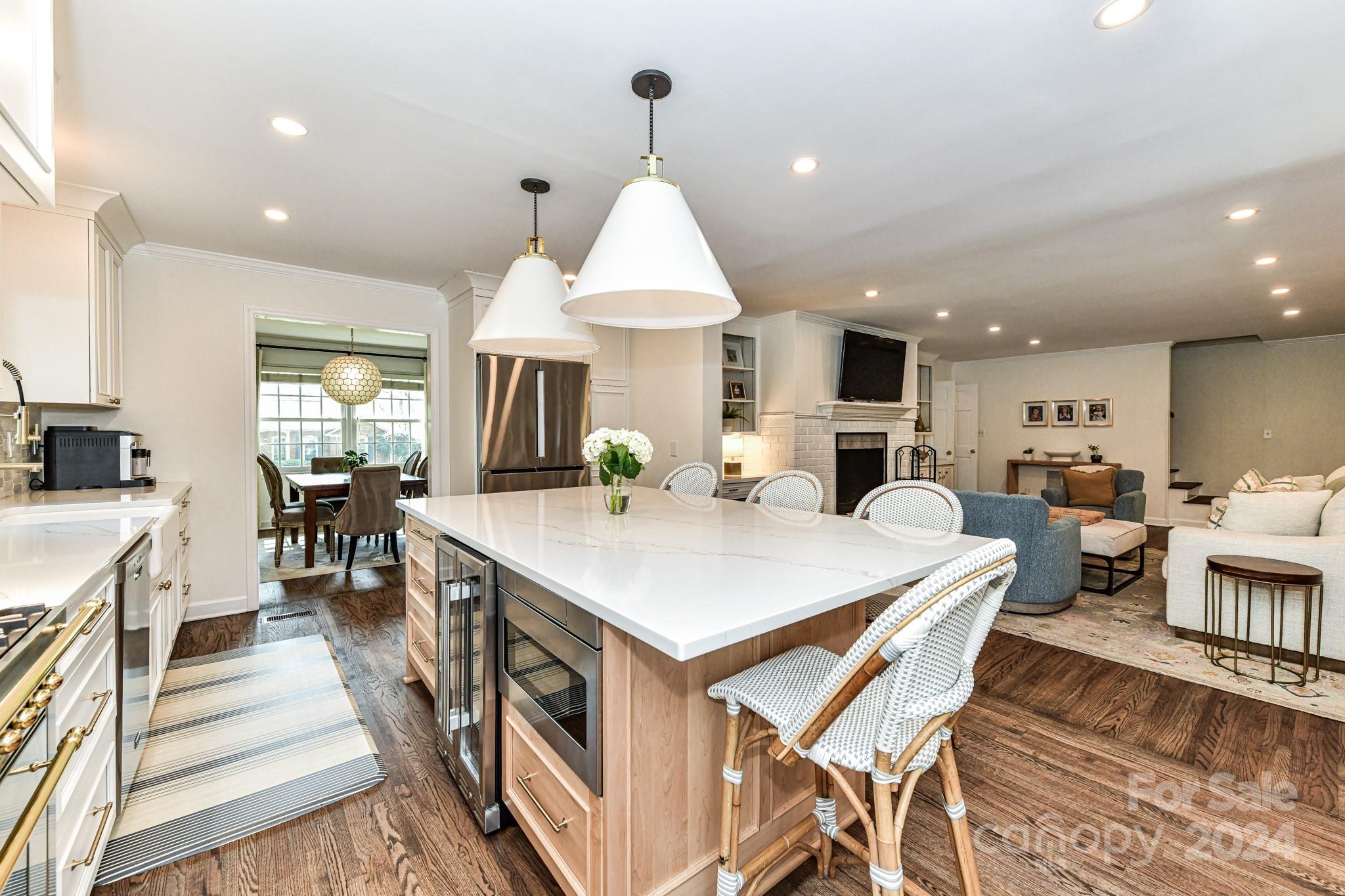 3026 Rustic Lane Charlotte, NC 28210 - Photo 13 of 39 a large kitchen with a table and chairs