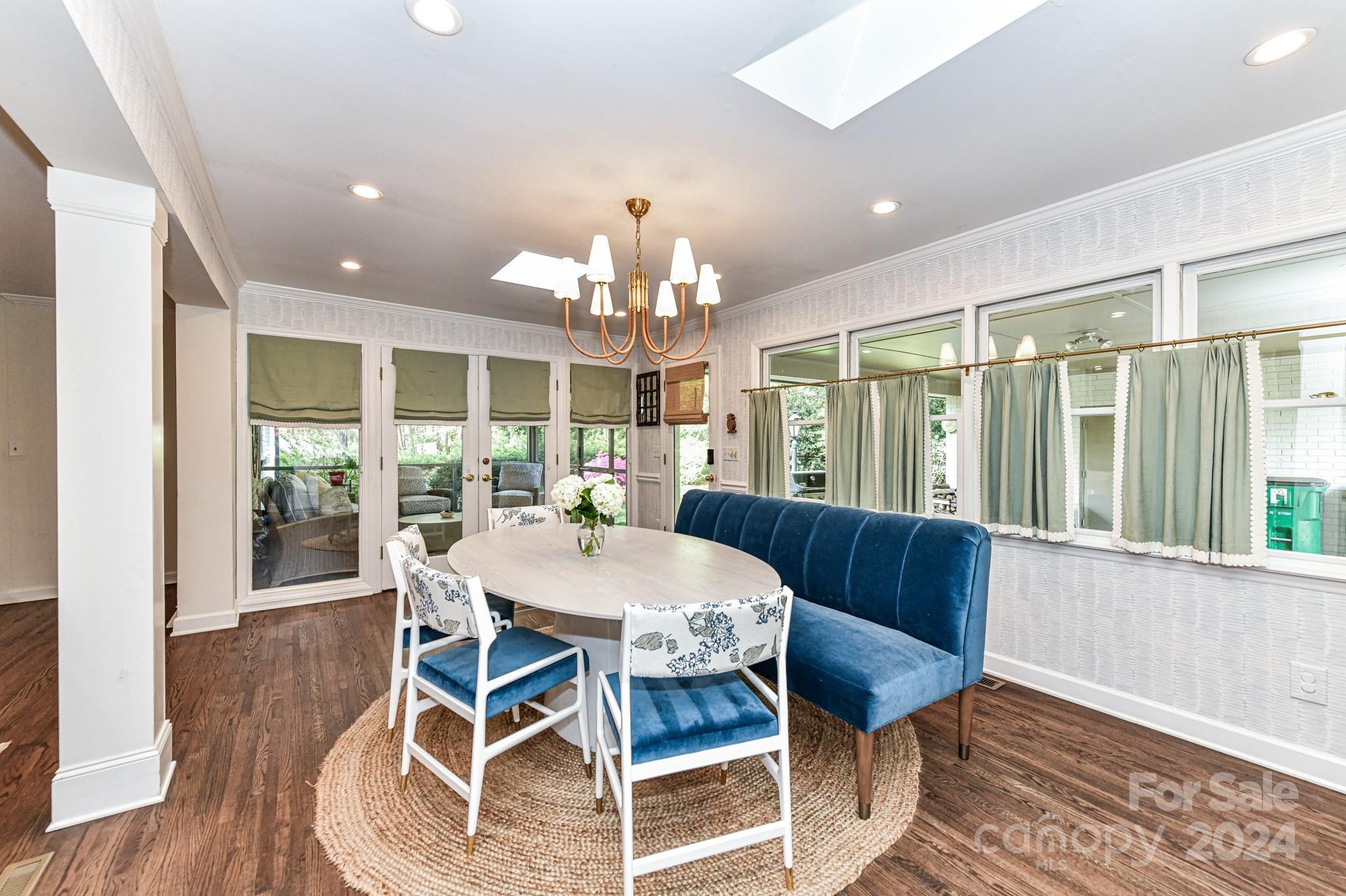 3026 Rustic Lane Charlotte, NC 28210 - Photo 14 of 39 a view of a dining room with furniture window and wooden floor