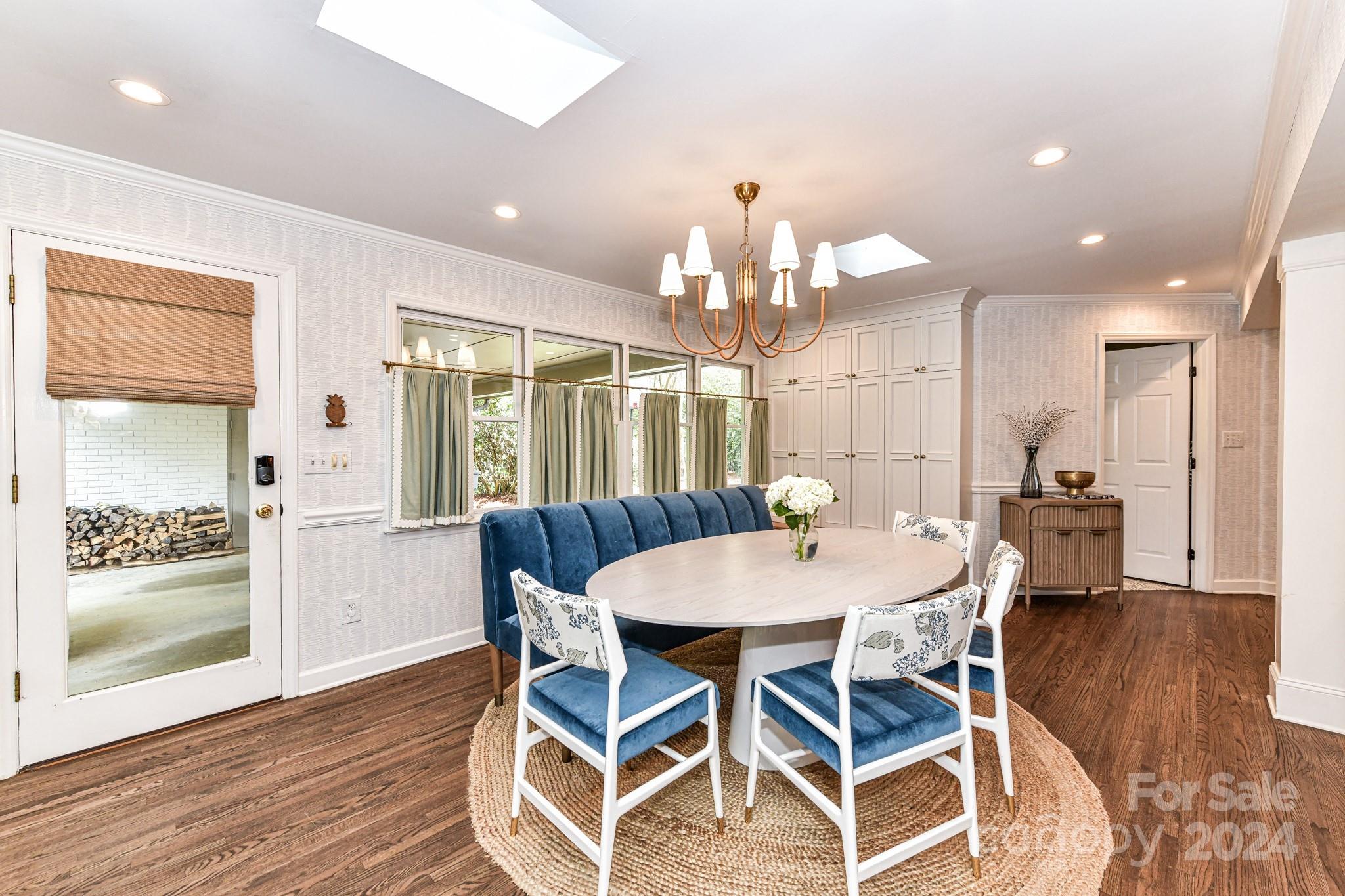 3026 Rustic Lane Charlotte, NC 28210 - Photo 15 of 39 a view of a dining room with furniture window and wooden floor