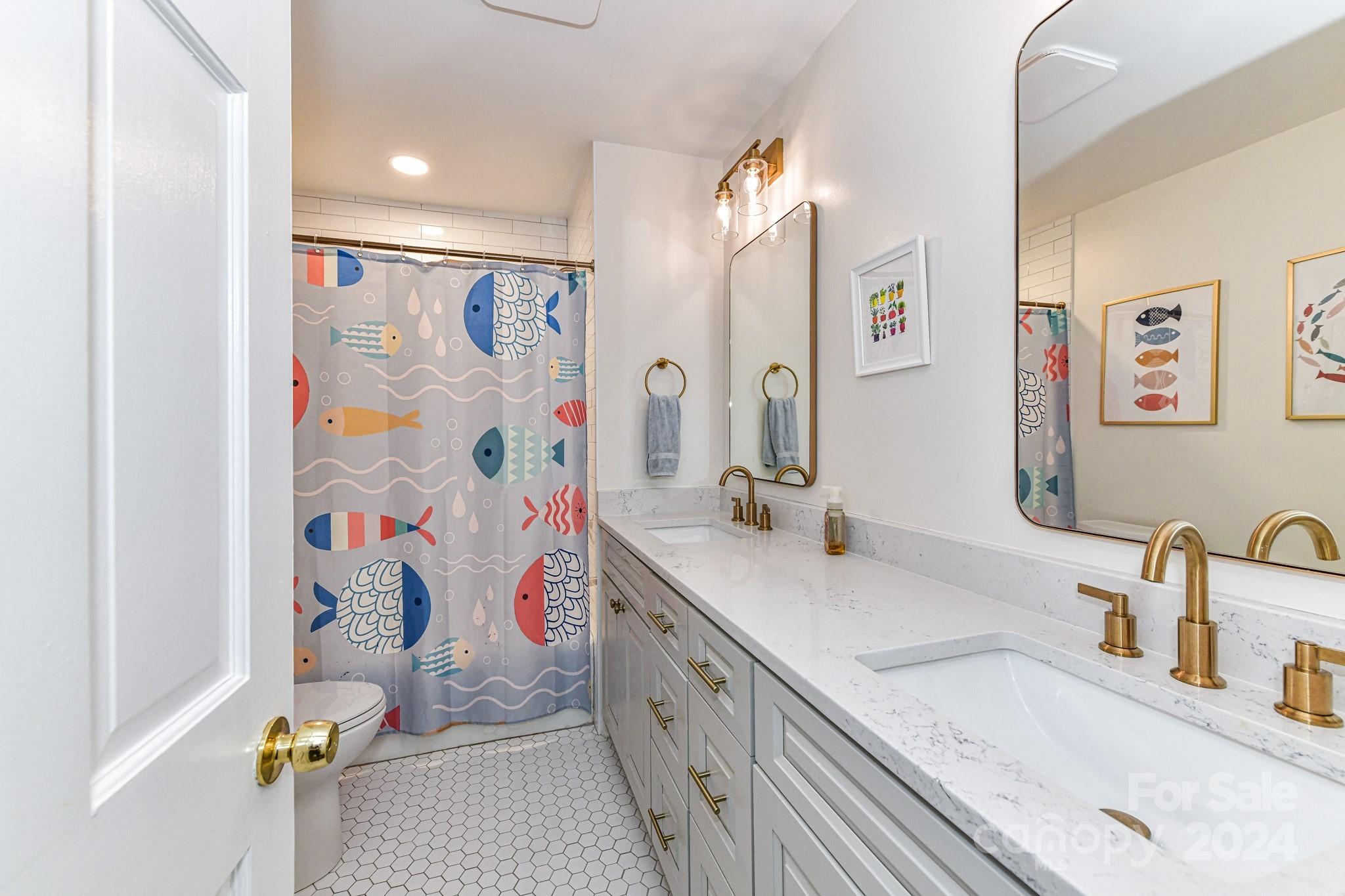 3026 Rustic Lane Charlotte, NC 28210 - Photo 24 of 39 a bathroom with a granite countertop bathtub sink and mirror