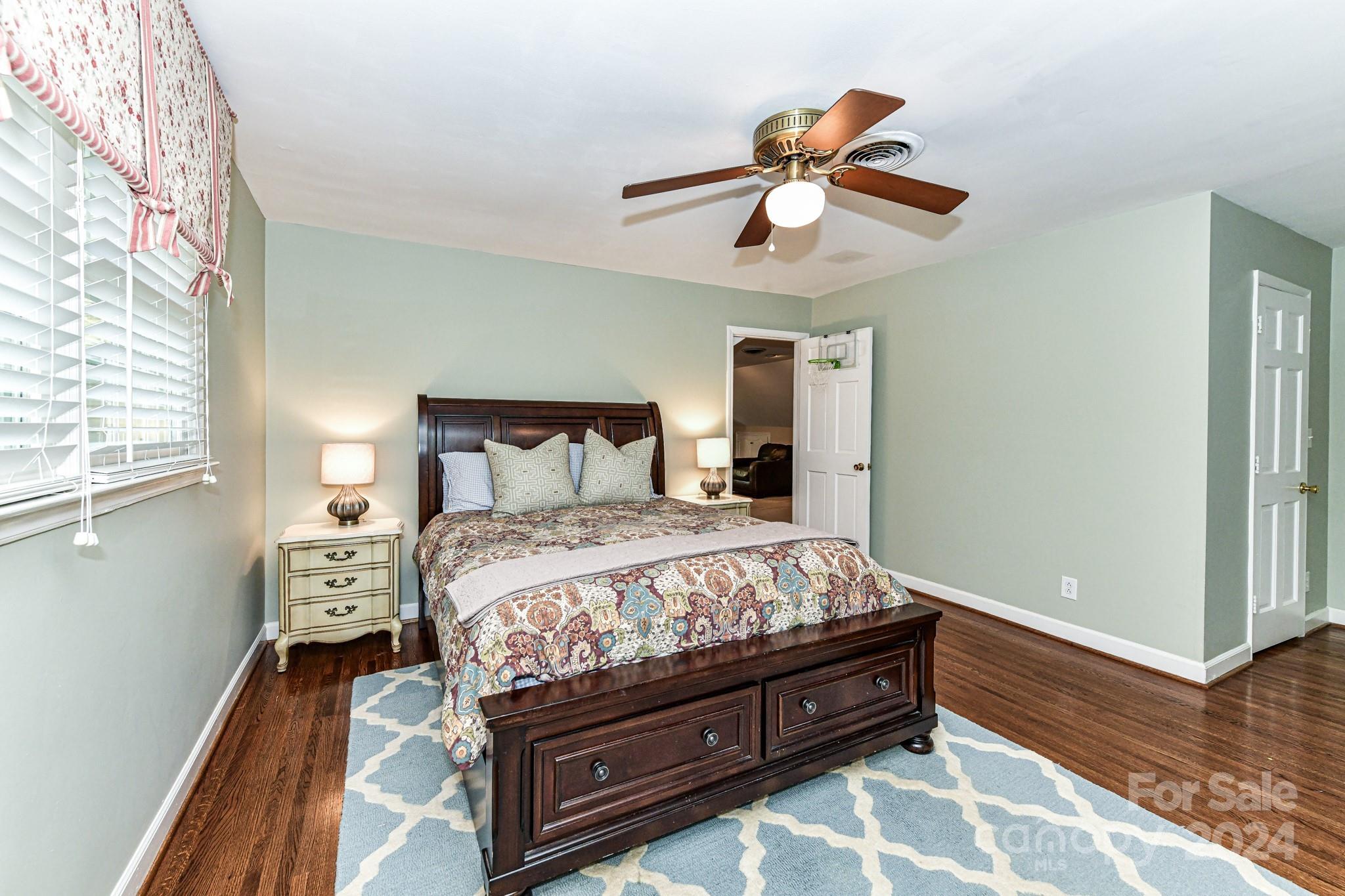 3026 Rustic Lane Charlotte, NC 28210 - Photo 28 of 39 a bedroom with a bed and a window