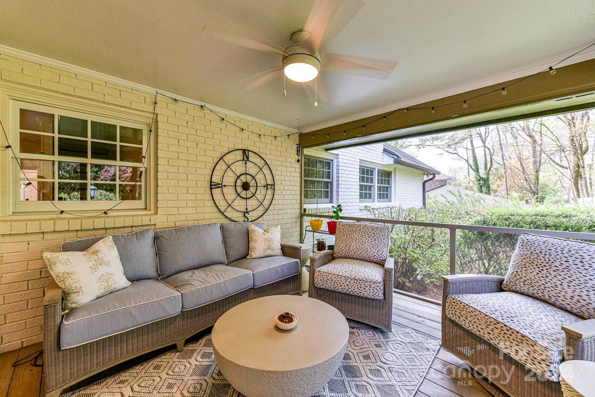 3026 Rustic Lane Charlotte, NC 28210 - Photo 33 of 39 a living room with furniture and a large window