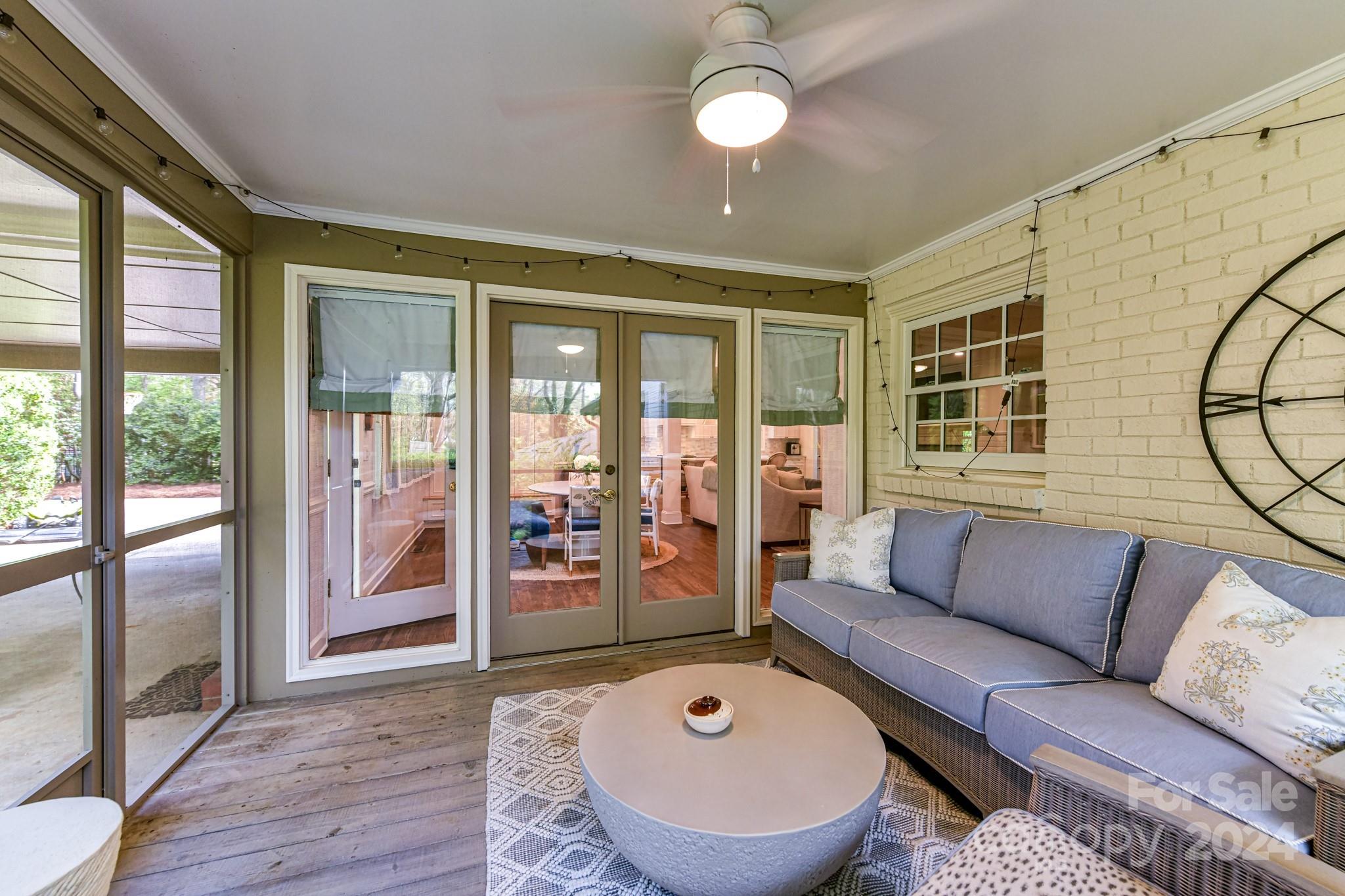 3026 Rustic Lane Charlotte, NC 28210 - Photo 34 of 39 a living room with furniture and a large window