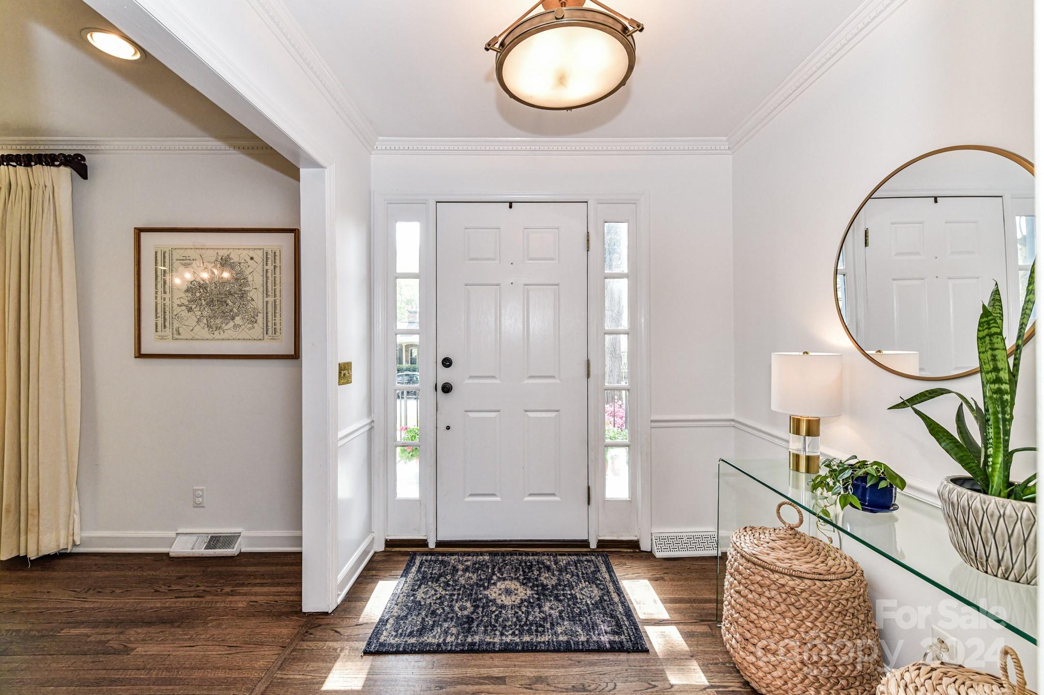 3026 Rustic Lane Charlotte, NC 28210 - Photo 5 of 39 a room with wooden floor and a rug