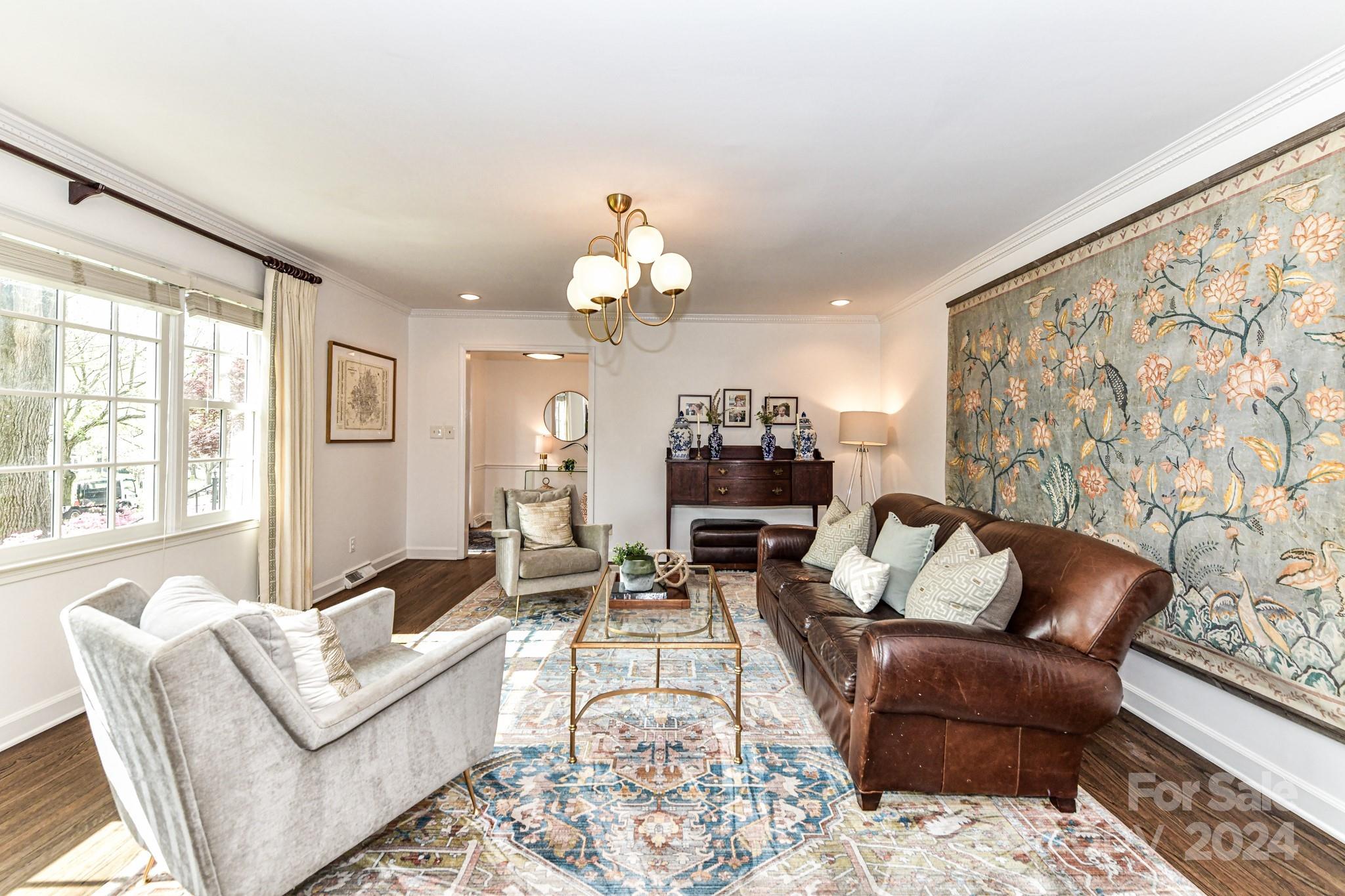 3026 Rustic Lane Charlotte, NC 28210 - Photo 6 of 39 a living room with furniture a rug and a large window