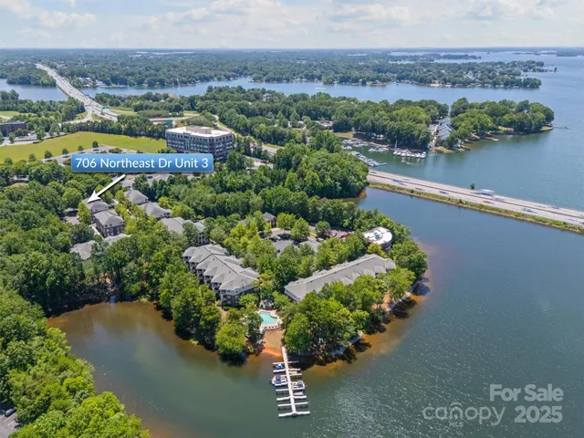 a view of a lake with a building in the background