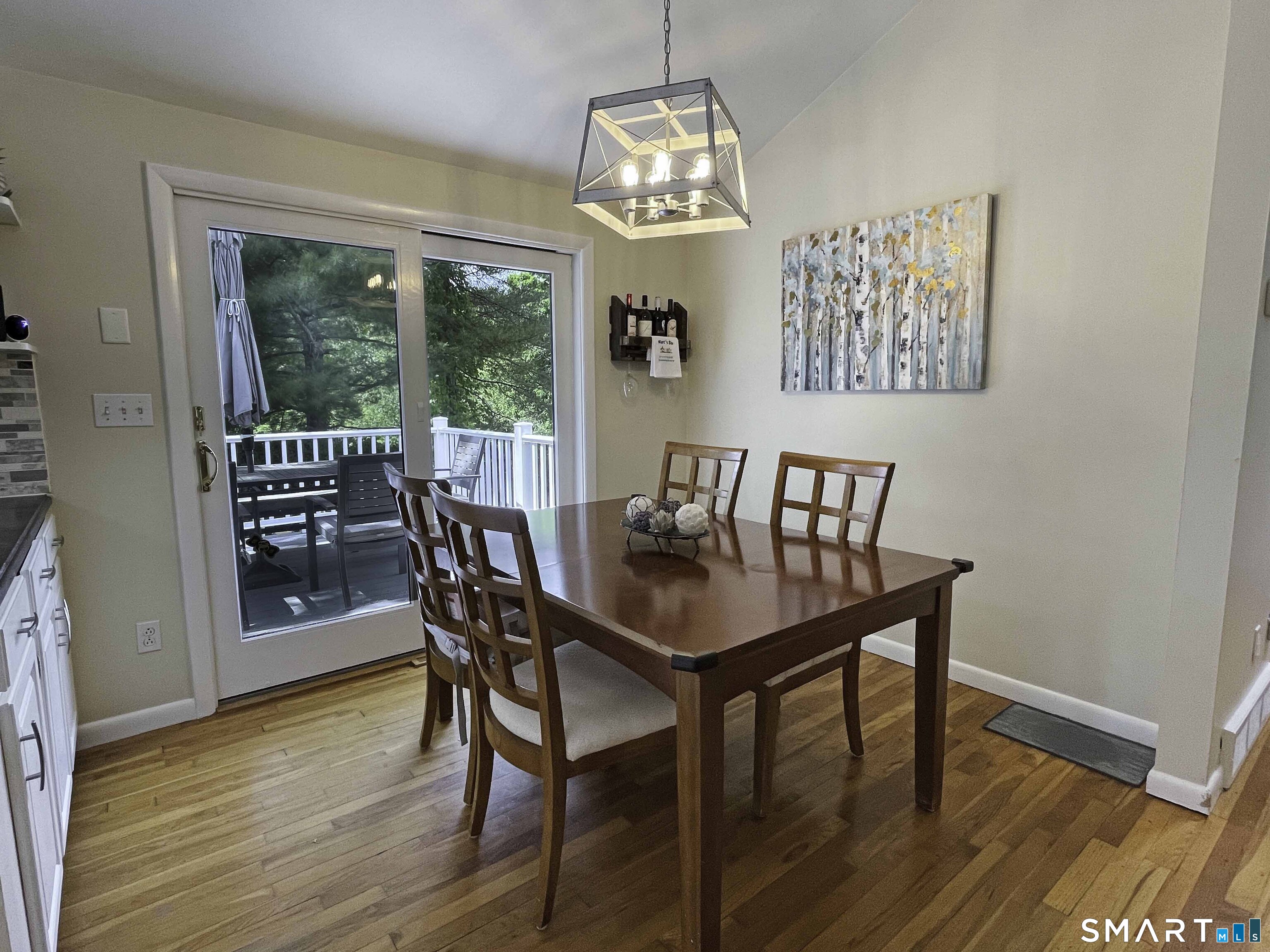 5 Sycamore Lane Brookfield, CT 06804 - Photo 9 of 25 Breakfast Nook with sliders to the deck.