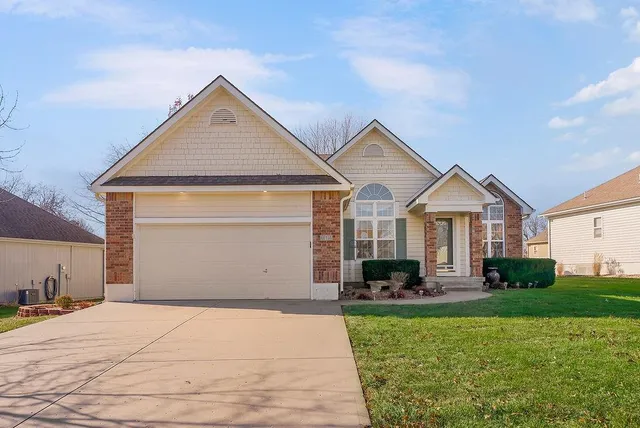 $365,000 | 614 Meadow Lark Drive, Raymore, MO 64083