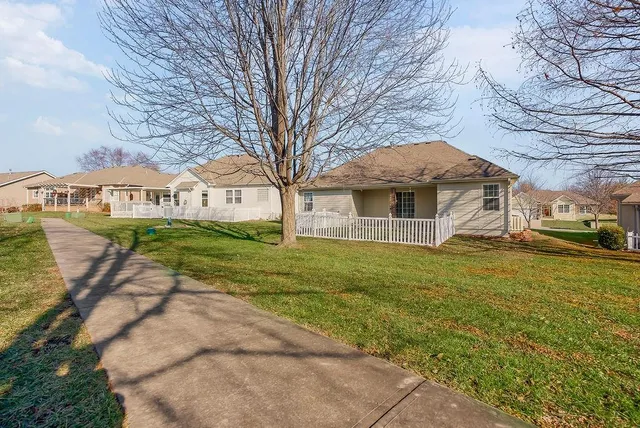 $365,000 | 614 Meadow Lark Drive, Raymore, MO 64083