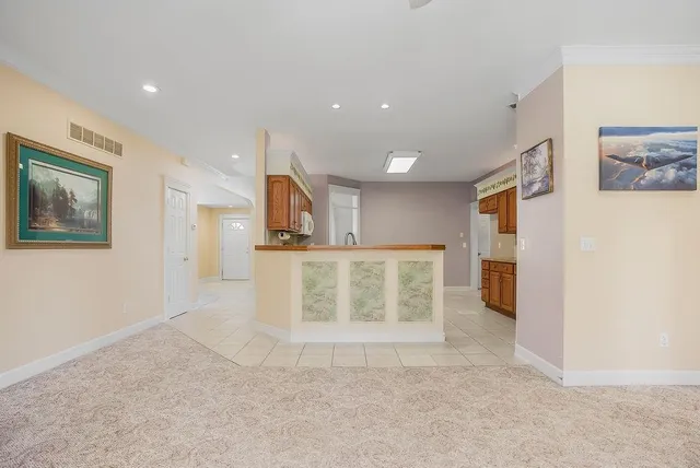 $365,000 | 614 Meadow Lark Drive, Raymore, MO 64083