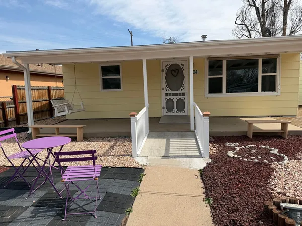 a front view of a house with patio