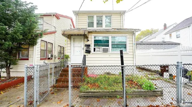 a kitchen with a refrigerator stove and a sink