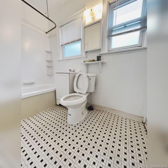 80-41 159th Street Queens, NY 11366 - Photo 13 of 13 Full bath with shower combination and toilet