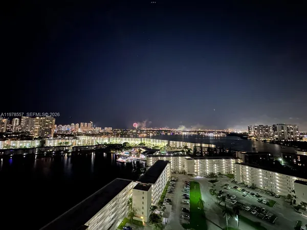 a view of a city with tall buildings