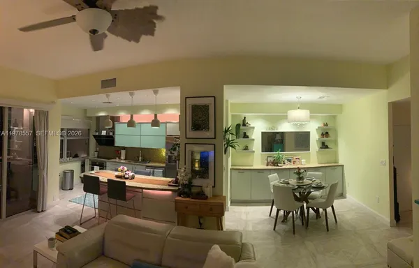 a bedroom with a bed and lamp