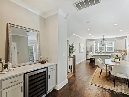 a view of kitchen with sink and breakfast area