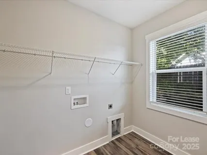 a view of a bedroom with a window