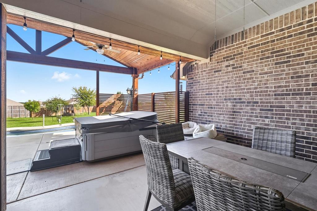 142 High Ridge Court Decatur, TX 76234 - Photo 28 of 40 a view of balcony with patio