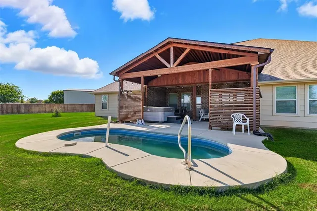 a front view of a house with entertaining space