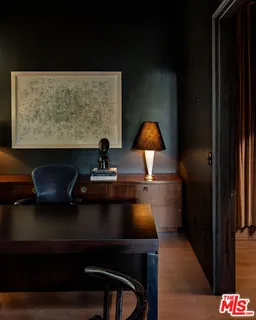 a room with a table and chairs