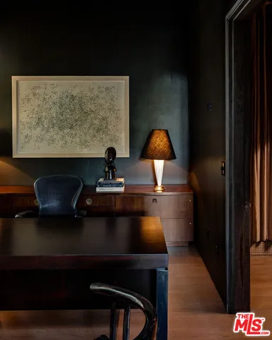 a room with a table and chairs