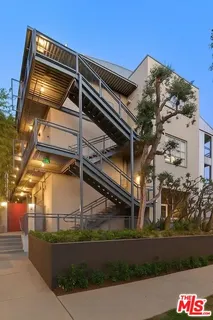 a front view of a building with street view