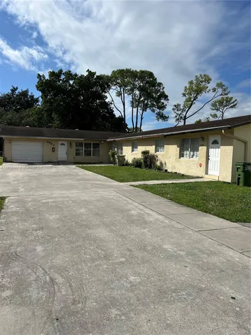 front view of house with a yard