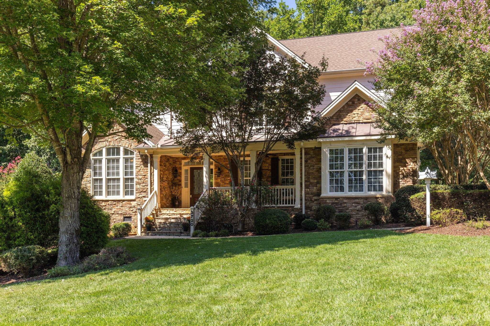3720 Grandbridge Drive Apex, NC 27539 - Photo 1 of 81 front view of a house with a yard