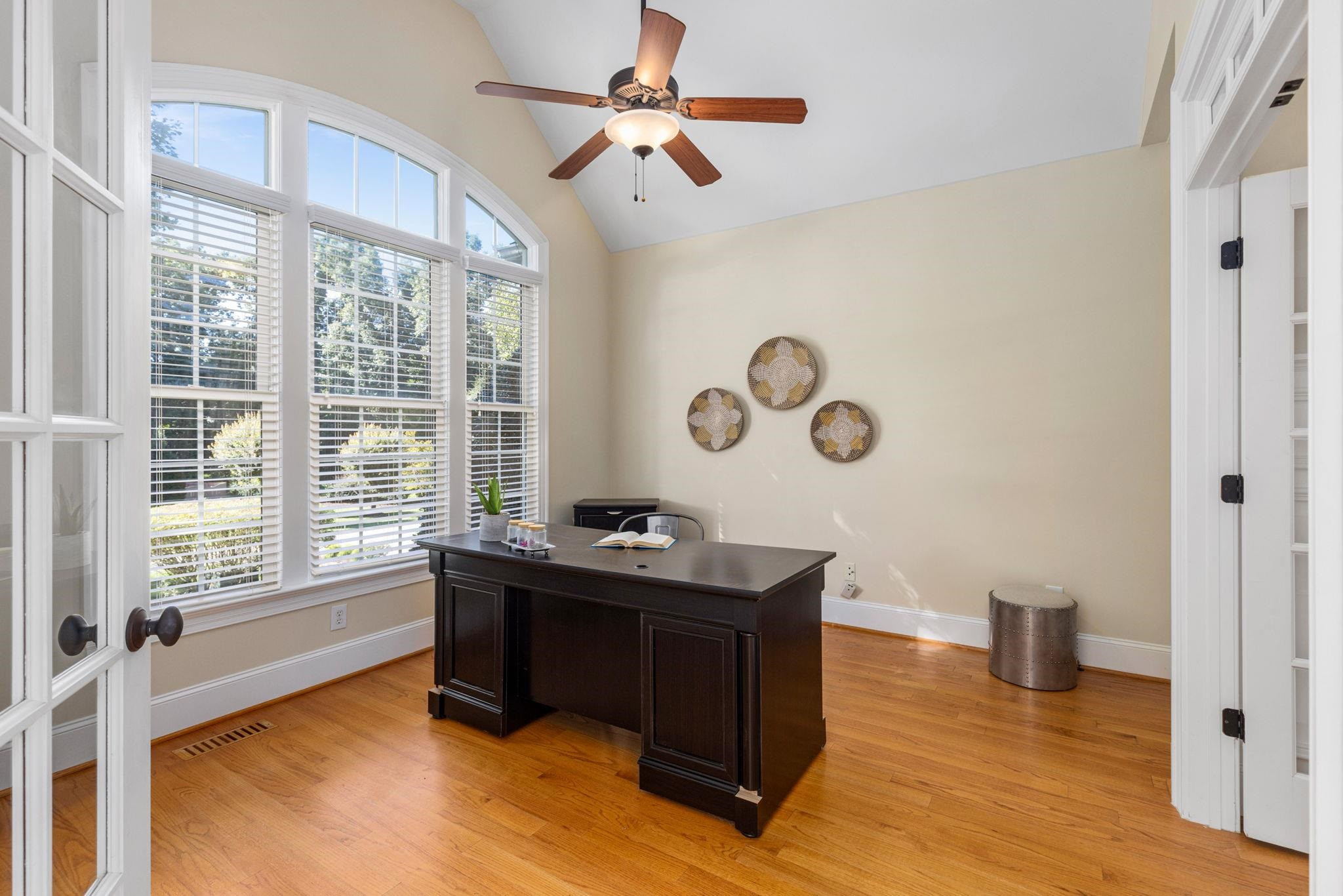 3720 Grandbridge Drive Apex, NC 27539 - Photo 12 of 81 a view of a workspace with furniture and a window